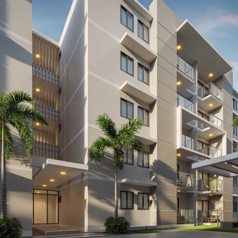 Bavaro Island II Smart Apartment for sale in Punta Cana featuring resort pool and tropical landscaping.