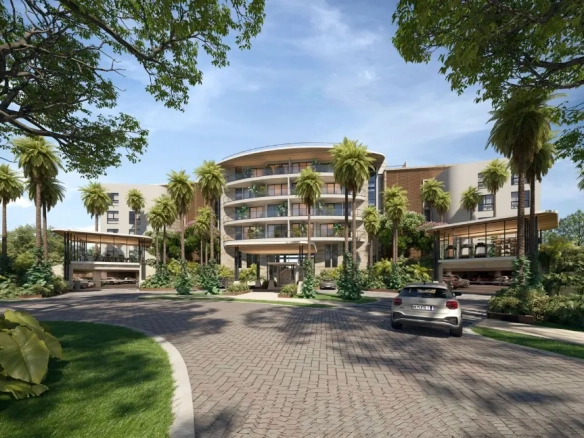 The FairWind 1 Bedroom Apartment for sale in Cap Cana featuring views of the Las Iguanas Golf Course and modern lobby.