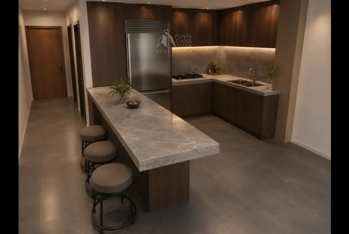 Living room view showing seamless flow to the dining space